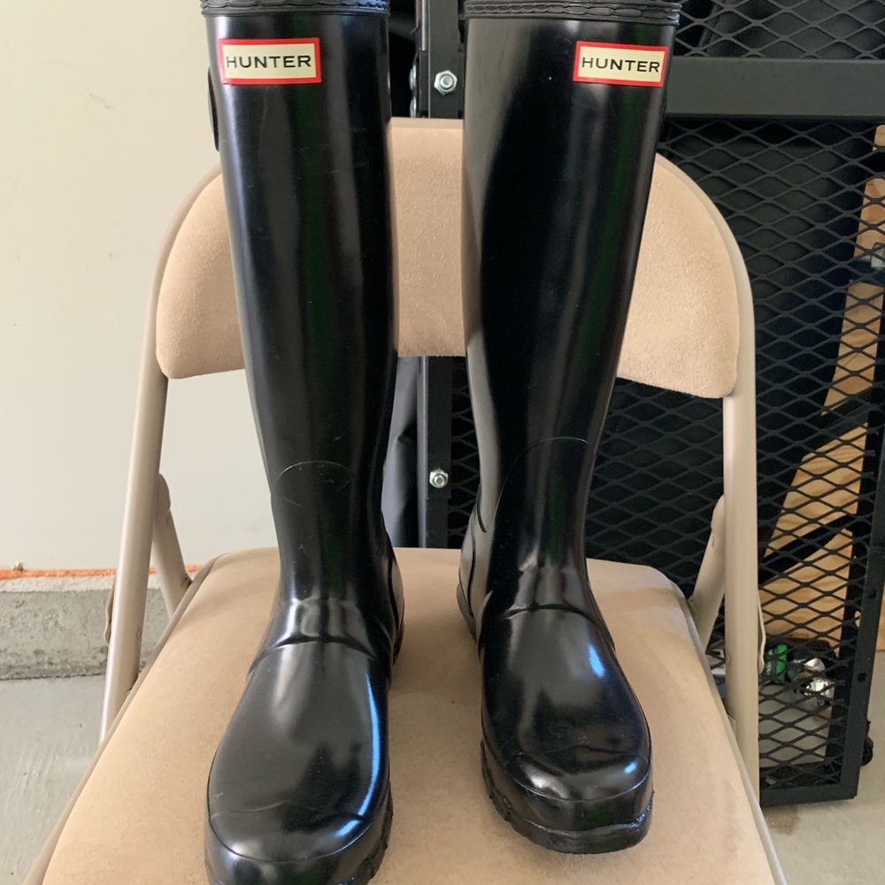 Tall glossy rain boots
